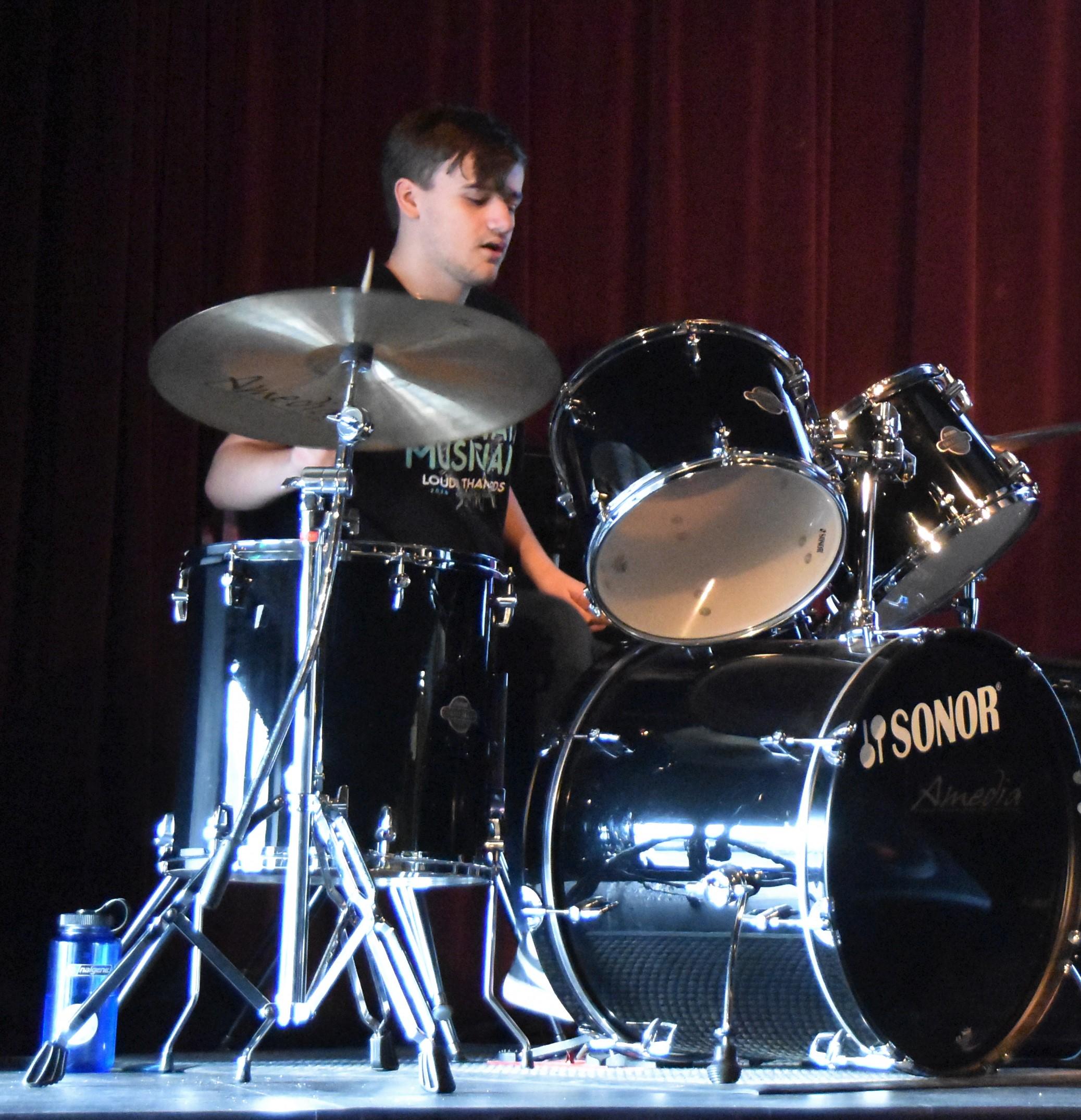 Orella on the drums at chapel