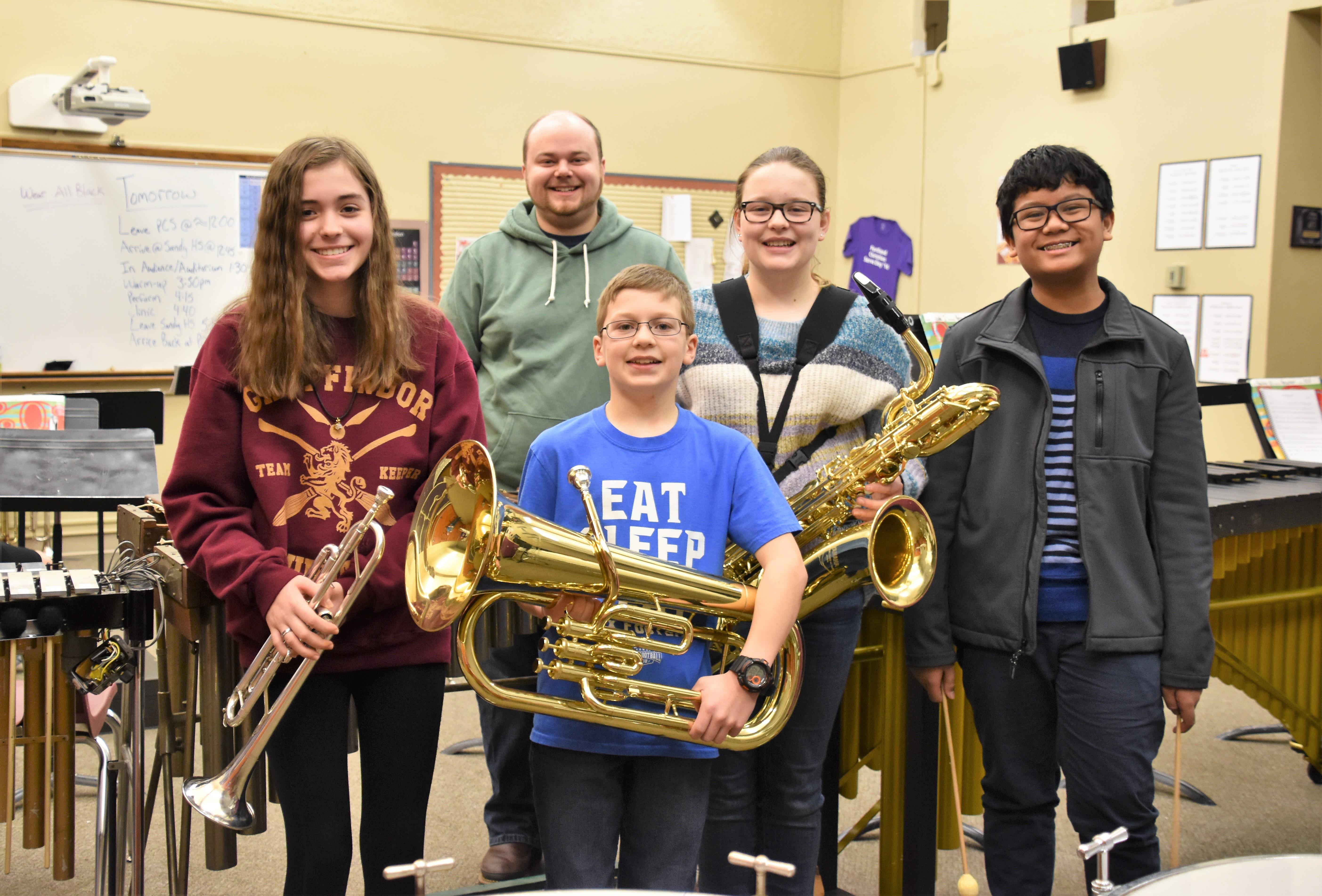 Four student musicians who won this honor