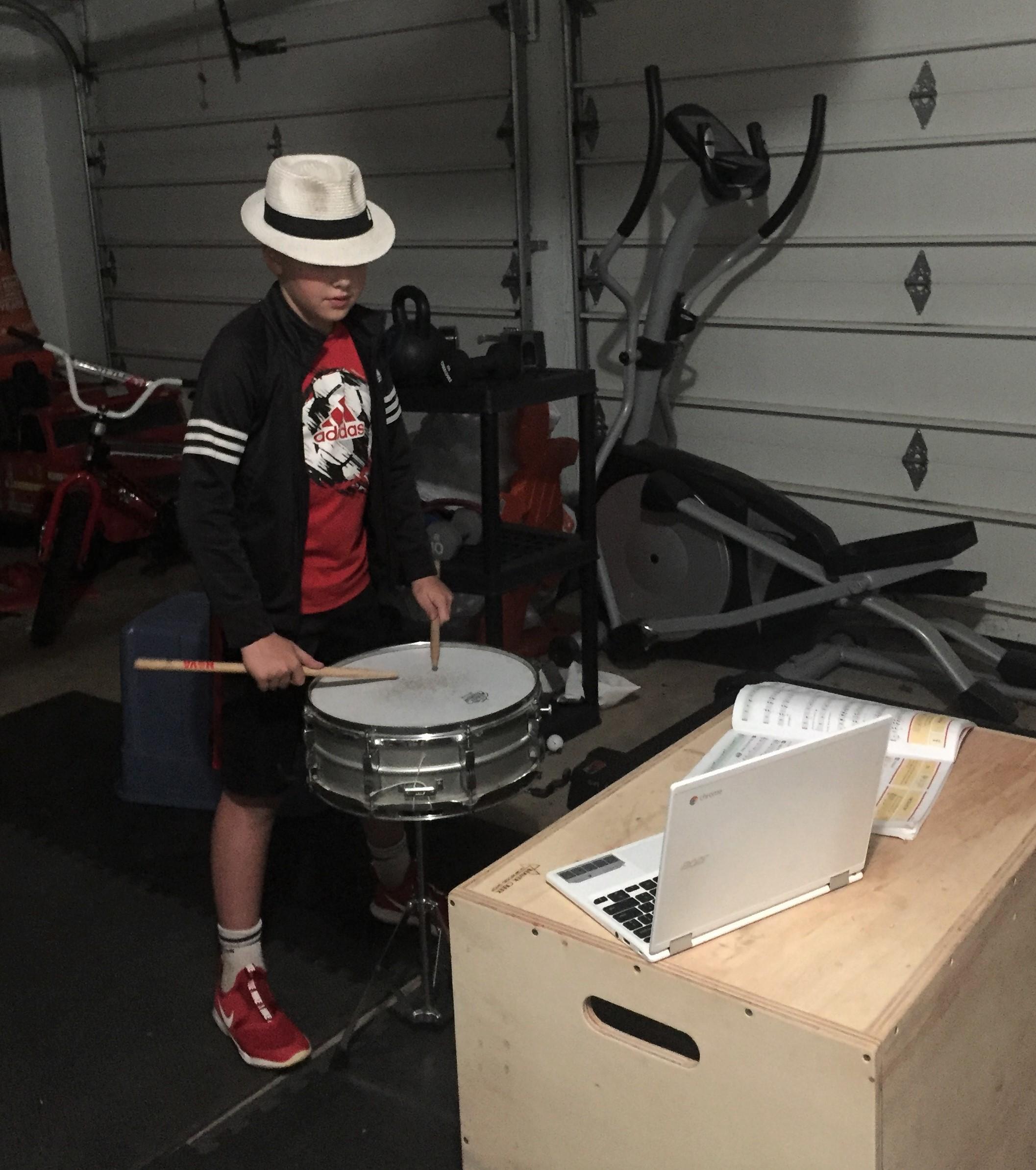 Student practicing the snare drum