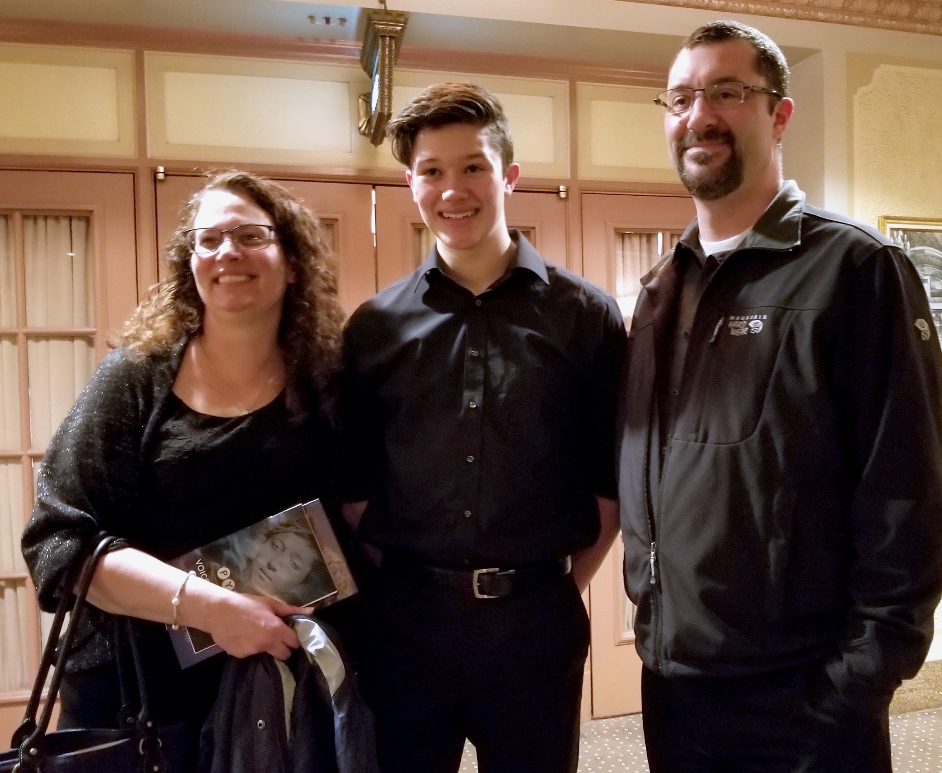 Blake with his parents after one of his PYP solo oboe performances
