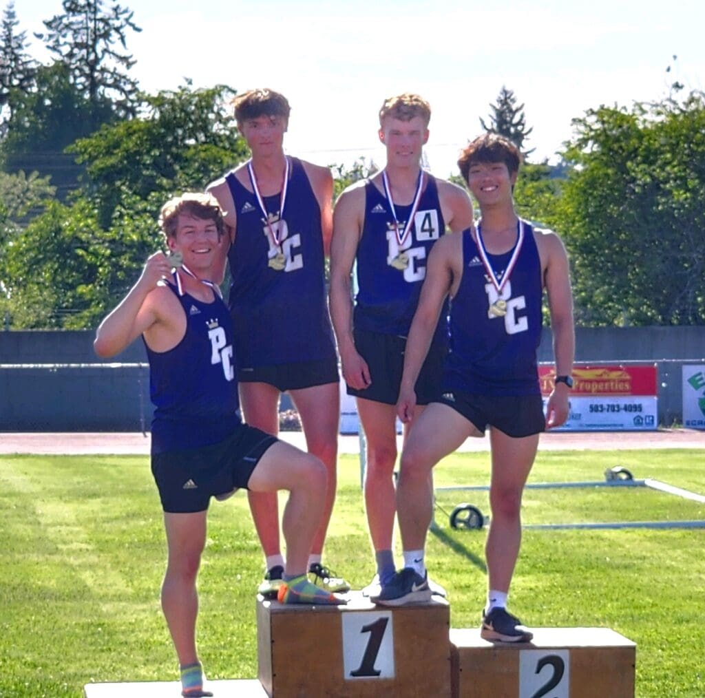 Josh with his teammates at the 2023 4x400m podium Districts meet
