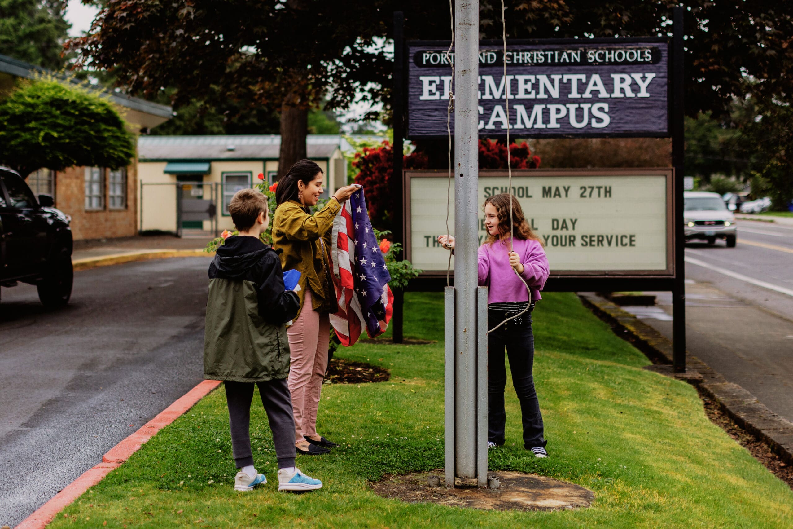Elementary Students with Campus Flag