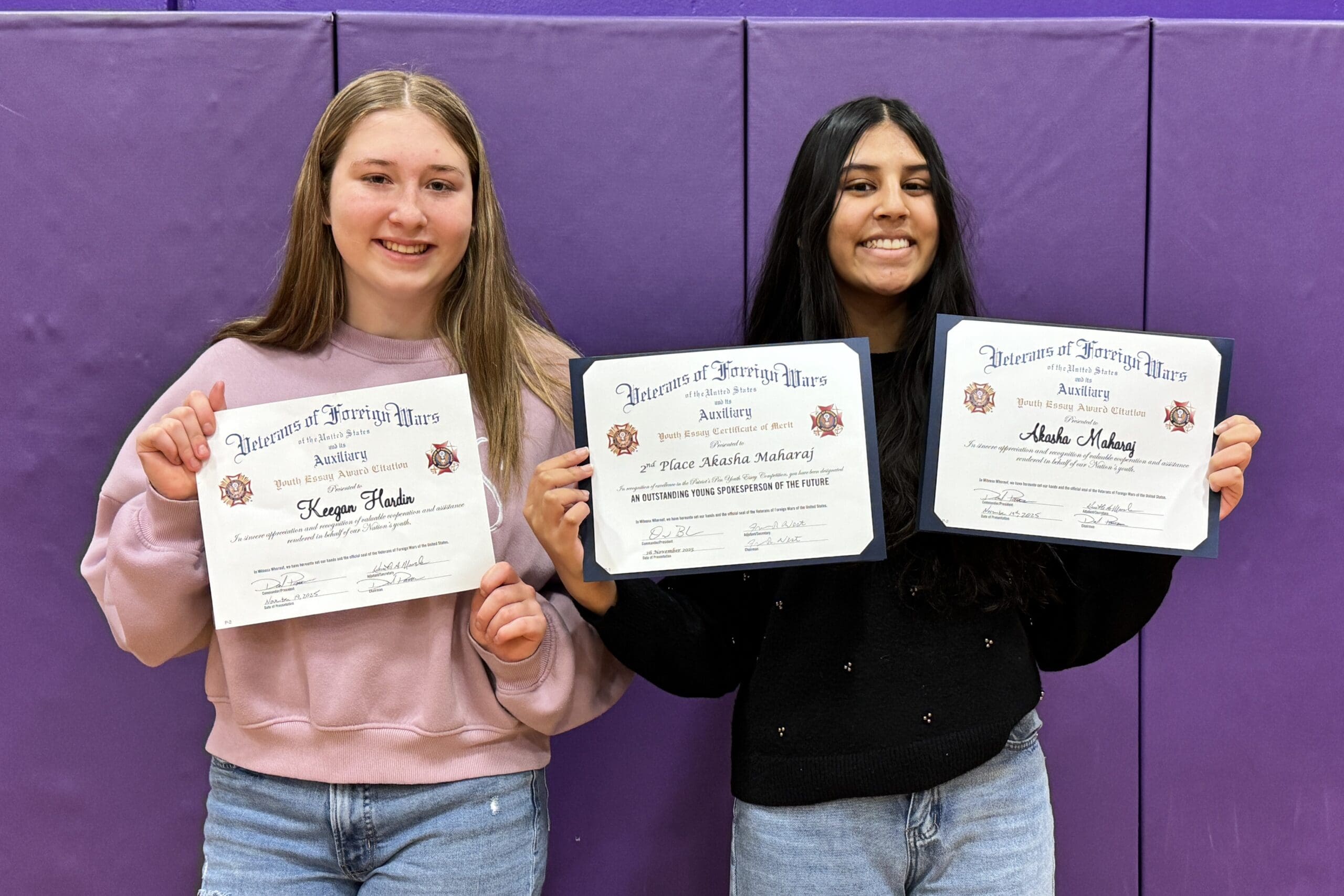 Students with their certificates for 2025-26 Certificates for Patriot's Pen