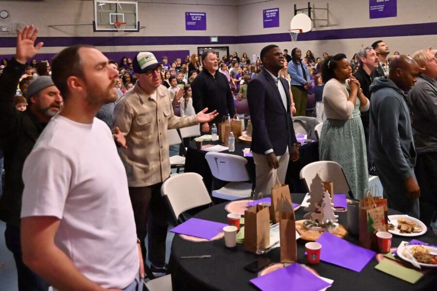 Pastors and students praising God