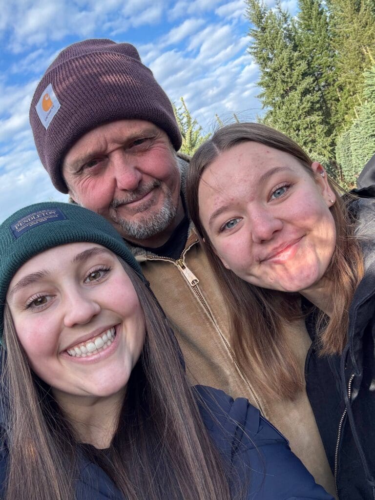 Grace Orfield with sister and dad